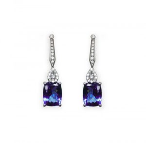 A photo of some white gold tanzanite and diamond earrings