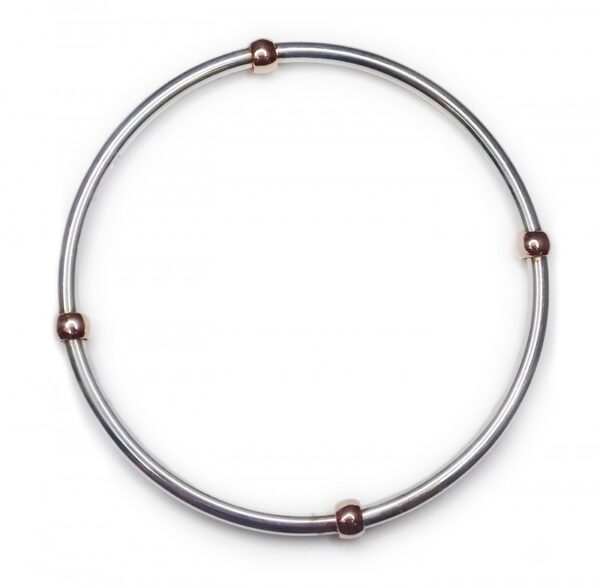 Image of handmade silver bracelet with 9ct gold rollerball