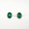 A photograph of some 18ct White Gold Emerald & Diamond Oval Earrings