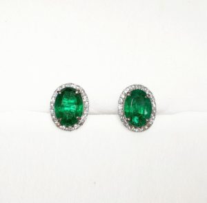 A photograph of some 18ct White Gold Emerald & Diamond Oval Earrings