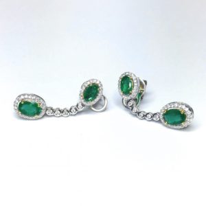 A photograph of some 18ct White Gold Emerald & Diamond Drop Earrings