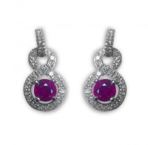 A photograph of some 18ct White Gold Ruby & Diamond Earrings