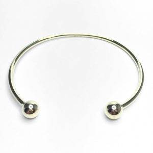 Image of fine solid torque bangle in 9ct yellow gold