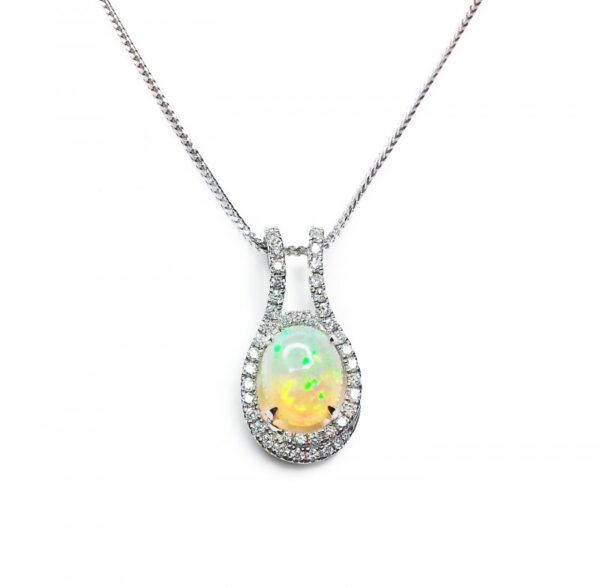 Image of opal & diamonds pendant in 18ct white gold