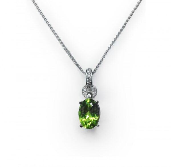 Image of peridot & diamond oval pendant in 9ct yellow gold