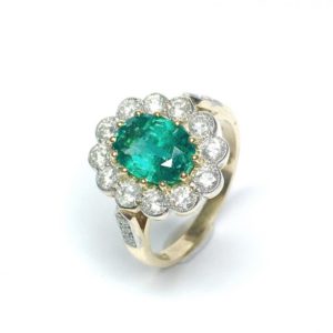 Image of second hand emerald & diamond ring in 18ct yellow gold