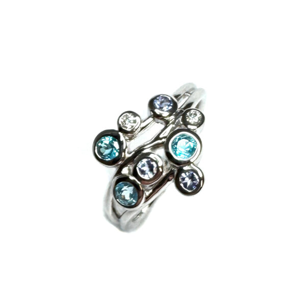 9ct White Gold Blue Topaz, Tanzanite And Diamond Ring